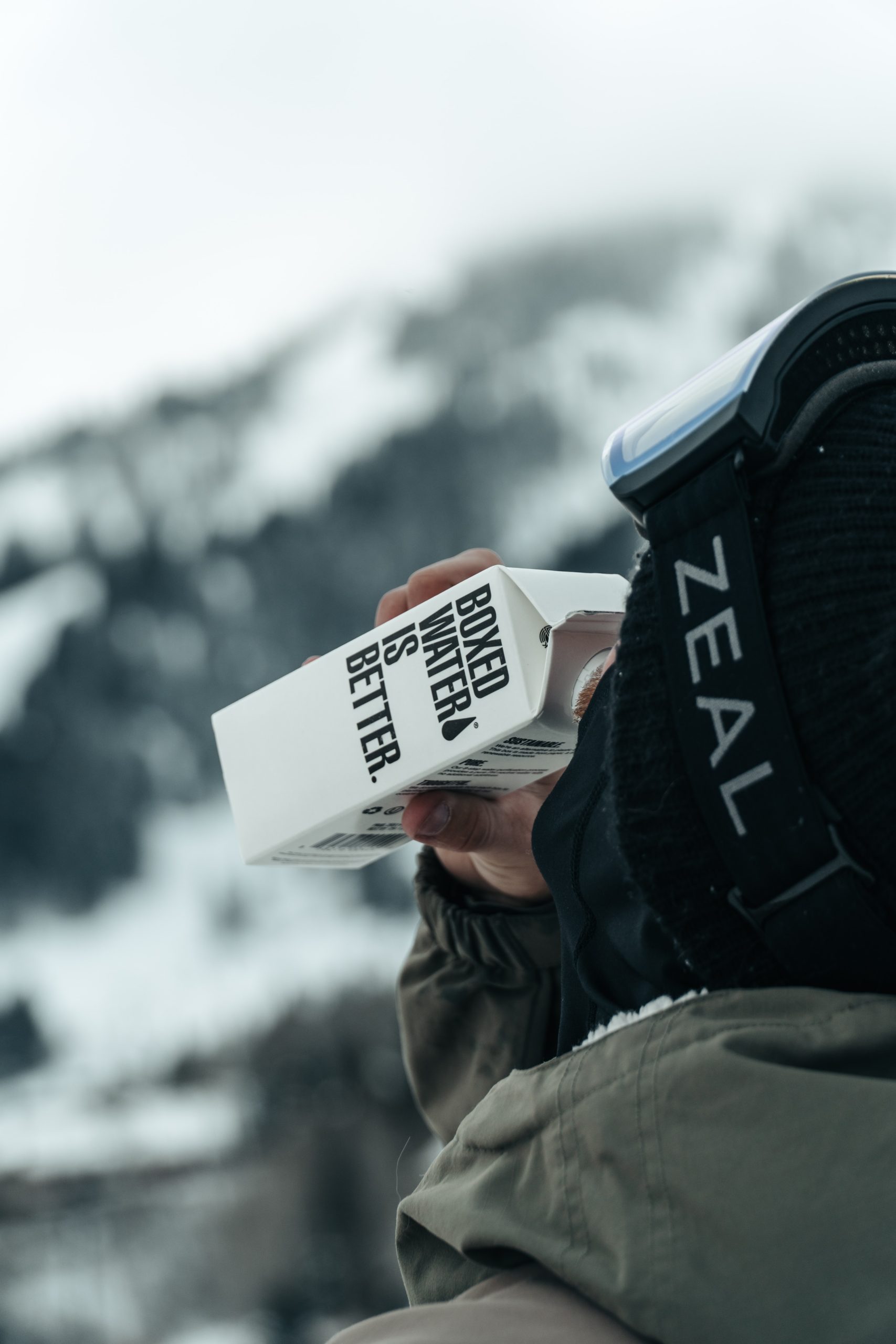 Man drinking boxed water